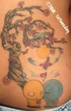 cherry blossom and cartoon tattoo